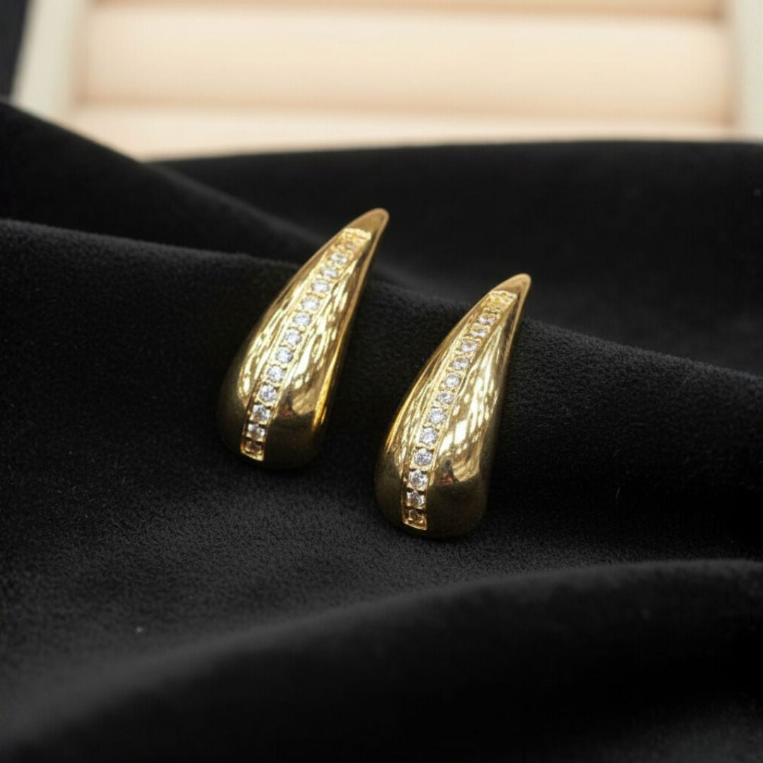 FLUIDE ARO PASANTE ORO 14K TIPO GANCHO C/FILA DE ZIRCON EN MEDIO