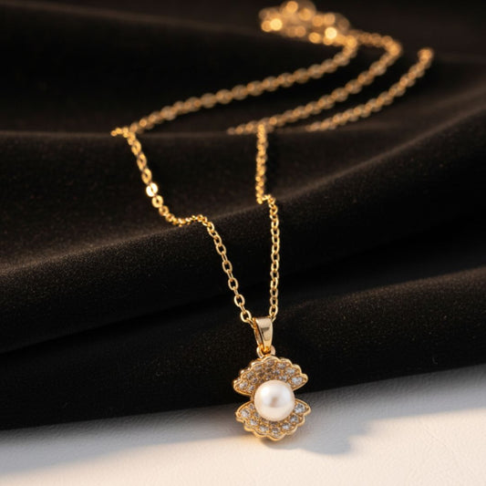 PERLA OCEANICA COLLAR DE ACERO DORADO