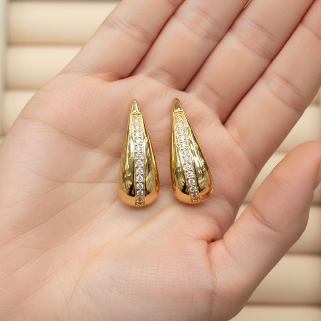 FLUIDE ARO PASANTE ORO 14K TIPO GANCHO C/FILA DE ZIRCON EN MEDIO